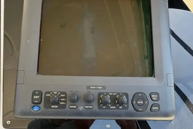 Slide: The Image of Fish finder display on a 2000 Silverton 42 Convertible boat. - 39