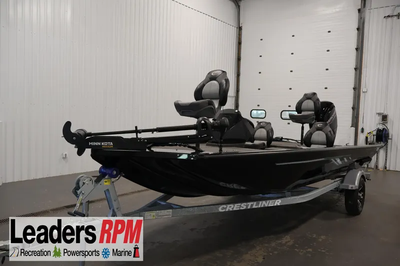 The Image of 2024 Crestliner XFC 179 fishing boat with Minn Kota trolling motor in showroom. - 1