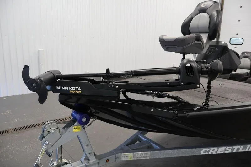 Slide: The Image of 2024 Crestliner XFC 179 boat with Minn Kota Maxxum trolling motor and comfortable seating. - 22