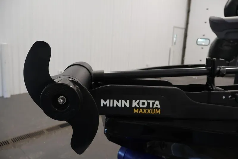 Slide: The Image of Minn Kota Maxxum motor on 2024 Crestliner XFC 179 boat, close-up view. - 23