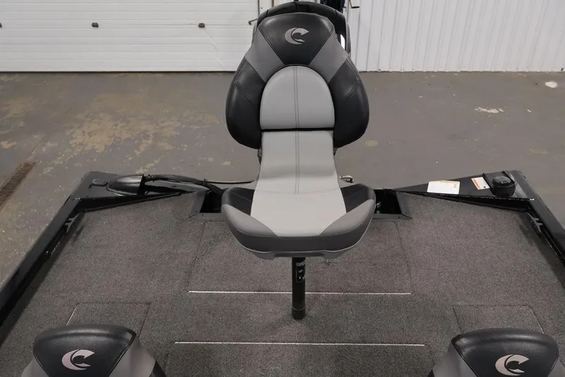 Slide: The Image of 2024 Crestliner XFC 179 boat interior with gray and black seating. - 40