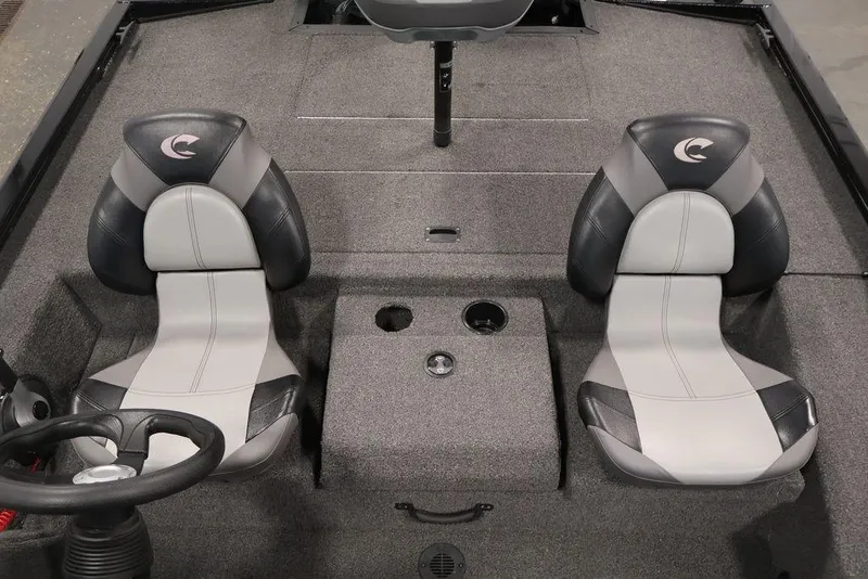 Slide: The Image of 2024 Crestliner XFC 179 boat interior with dual seats and steering wheel. - 42