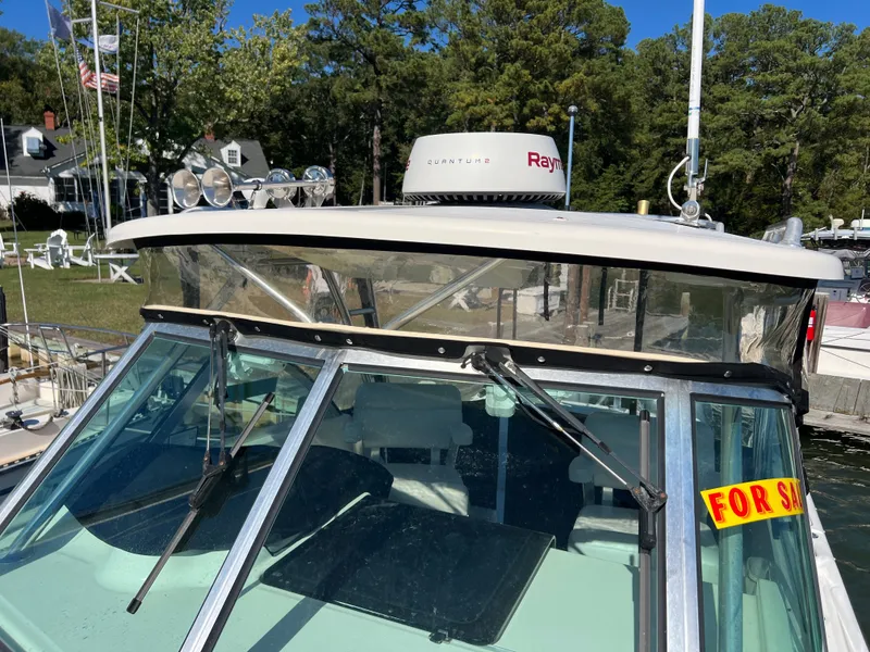 Slide: The Image of 2008 Pursuit OS 285 Offshore with Raymarine radar, offered for sale. - 33
