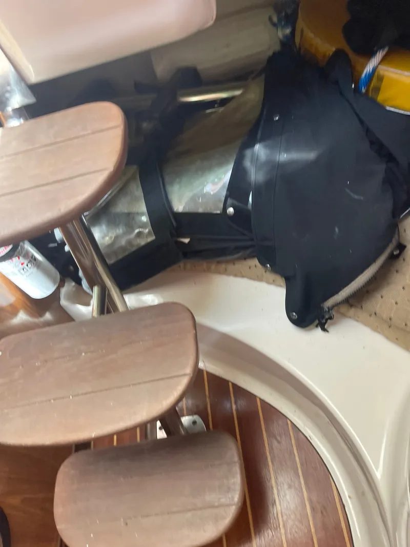 Slide: The Image of Interior view of a yacht with wooden steps and equipment. - 1