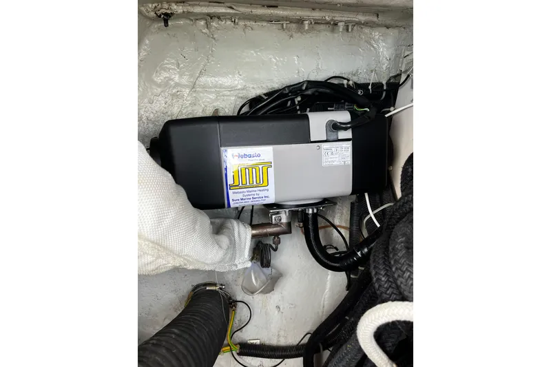 Slide: The Image of Marine heater installation in a 2004 Hanse 411 yacht engine compartment. - 36