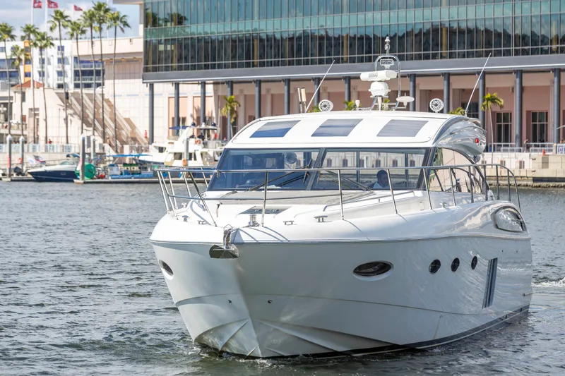Slide: The Image of 2013 Princess V57 luxury yacht docked in harbor. - 3