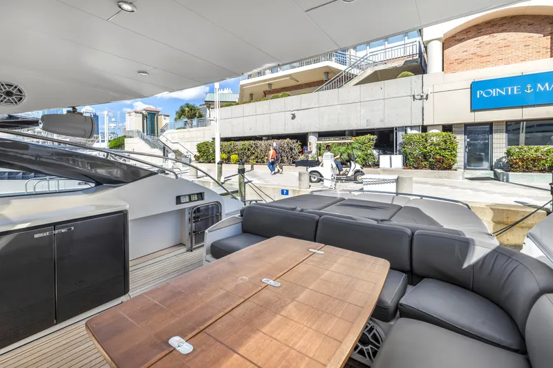 Slide: The Image of 2013 Princess V57 luxury yacht docked with modern interior. - 31