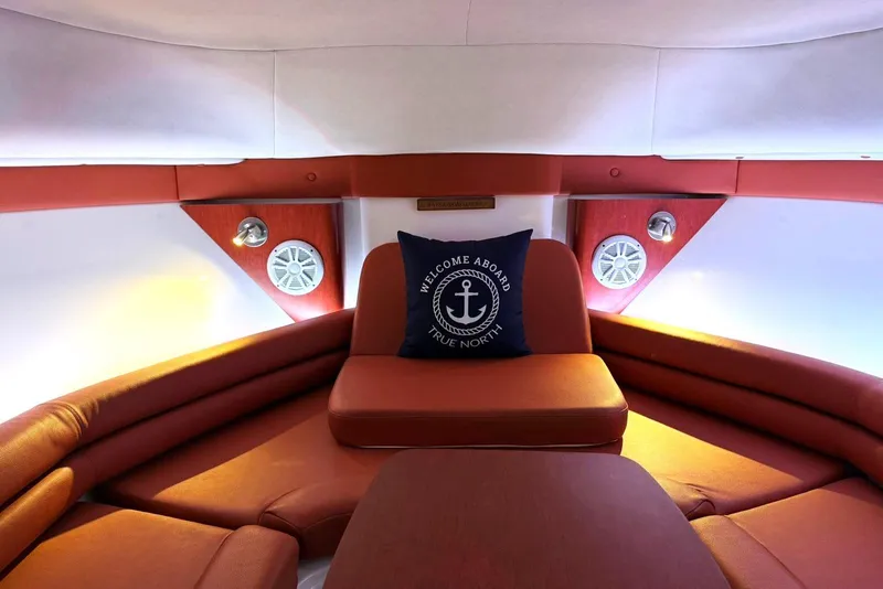 Slide: The Image of Luxurious interior of 2006 Pro-Line 32 Express boat with cozy seating and nautical decor. - 19
