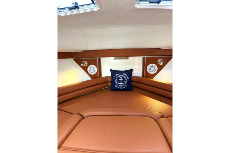 Slide: The Image of Luxurious cabin interior of 2006 Pro-Line 32 Express boat with plush seating. - 20