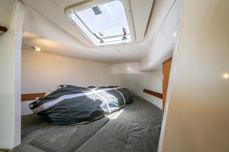 Slide: The Image of Cozy cabin interior of 2018 J Boats J/97E sailboat with overhead hatch. - 16