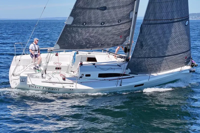 Slide: The Image of 2018 J Boats J/97E sailing on open water with crew onboard. - 3