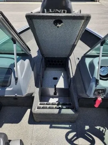 Slide: The Image of 2014 Lund Impact 1875 boat interior storage compartment. - 7