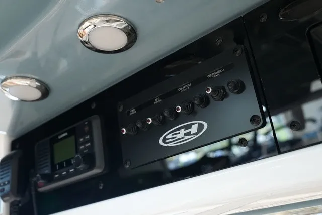 Slide: The Image of Control panel and electronics on a Sea Hunt Ultra 265SE boat. - 35
