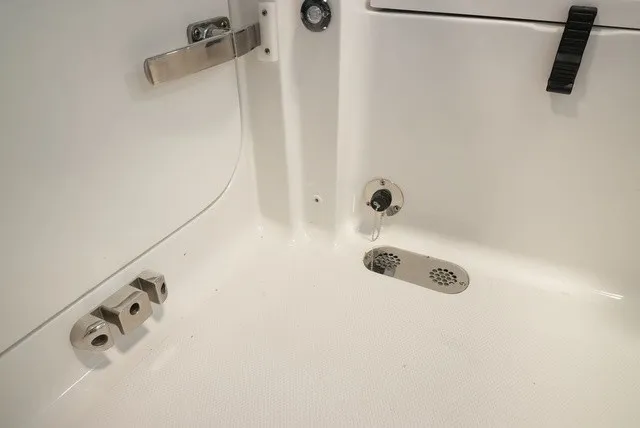 Slide: The Image of Close-up of a Sea Hunt Ultra 265SE deck with drain and fittings. - 25