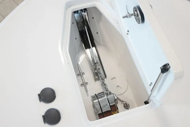 Slide: The Image of Anchor locker with chain and windlass on a boat. - 49