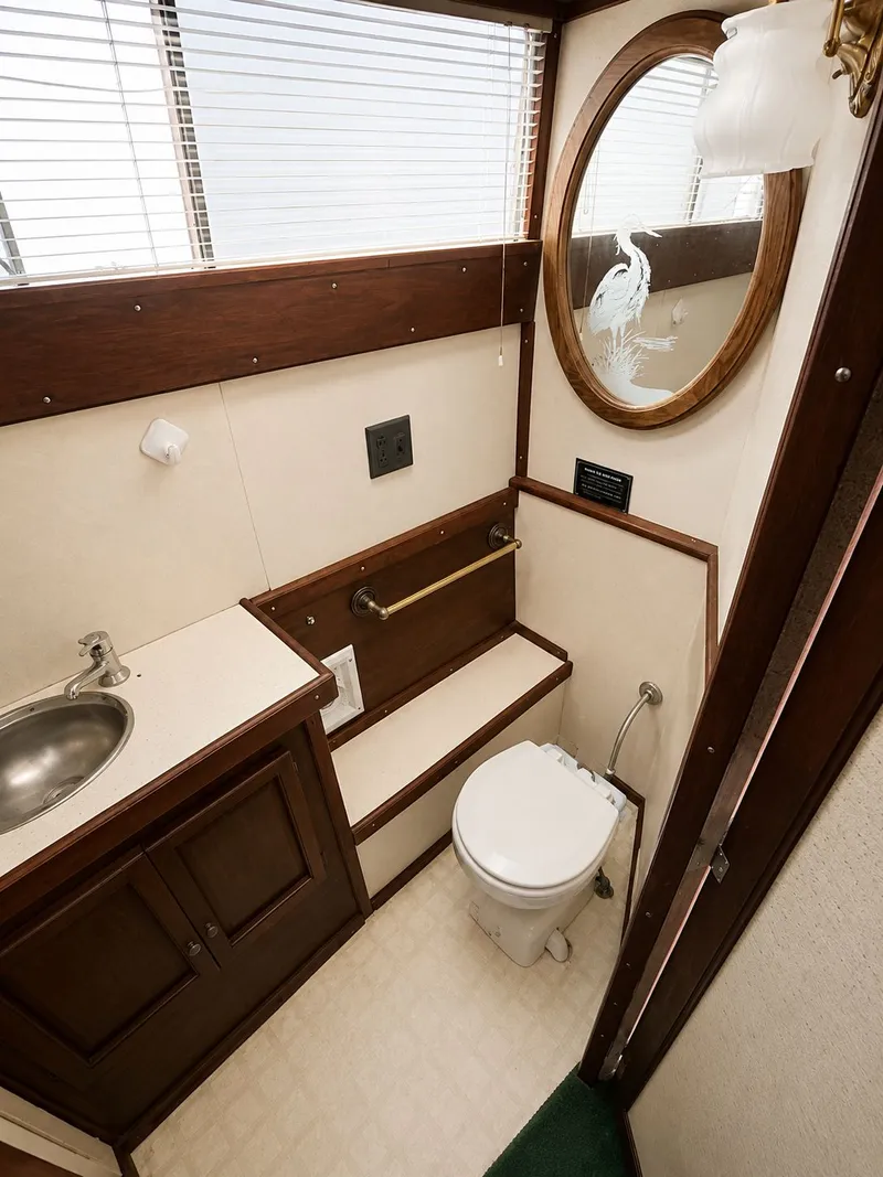 Slide: The Image of Interior view of the bathroom on a 1951 Chris-Craft 50 Catalina boat. - 13