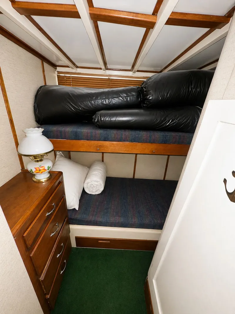 Slide: The Image of Interior of 1951 Chris-Craft 50 Catalina with bunk beds. - 15