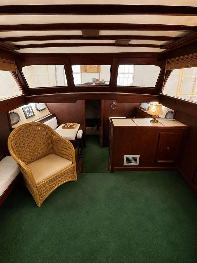 Slide: The Image of Interior of a 1951 Chris-Craft 50 Catalina yacht with wooden furnishings. - 18