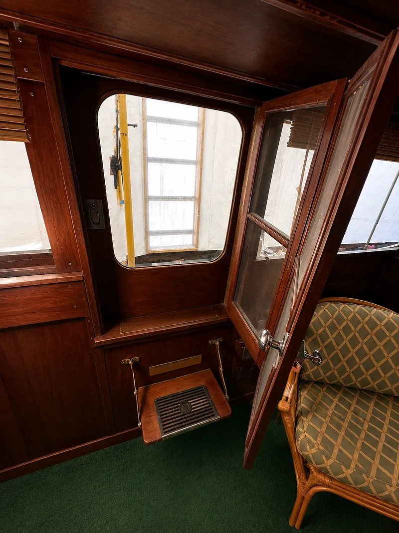 Slide: The Image of Interior of a 1951 Chris-Craft 50 Catalina yacht with wooden doors. - 19