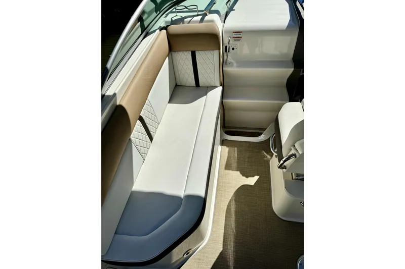 Slide: The Image of Interior seating of 2018 Sea Ray Sundancer 260 boat, featuring elegant upholstery and modern design. - 3