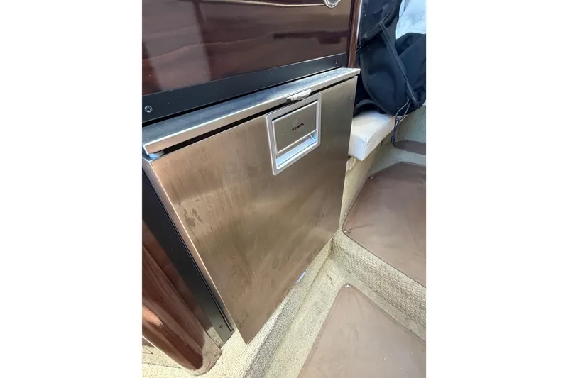 Slide: The Image of Stainless steel refrigerator inside 2018 Sea Ray Sundancer 260 boat cabin. - 35