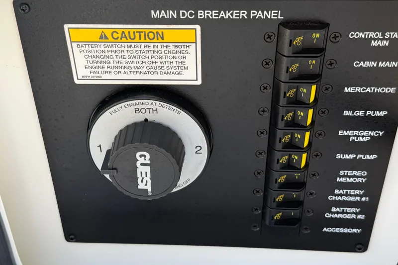 Slide: The Image of Main DC breaker panel on 2018 Sea Ray Sundancer 260 with battery switch and labeled controls. - 44