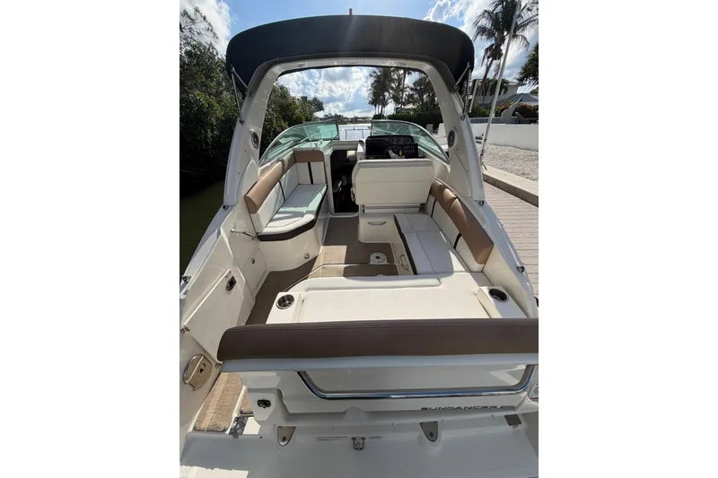 Slide: The Image of 2018 Sea Ray Sundancer 260 boat interior with spacious seating and sleek design. - 60