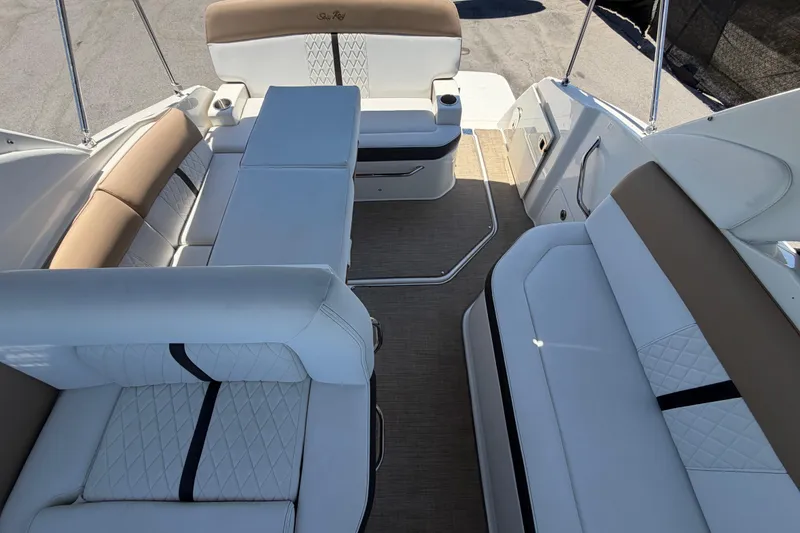 Slide: The Image of 2018 Sea Ray Sundancer 260 boat interior with luxurious seating and elegant design. - 79