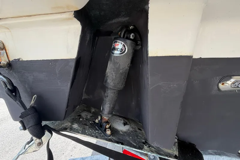 Slide: The Image of Close-up of 2018 Sea Ray Sundancer 260 boat's hydraulic trim tab system. - 7