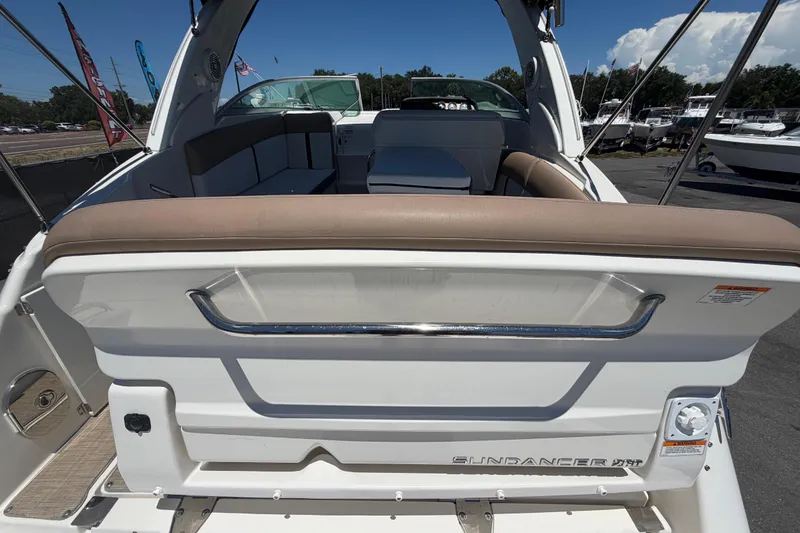 Slide: The Image of 2018 Sea Ray Sundancer 260 boat interior with seating and sleek design. - 98