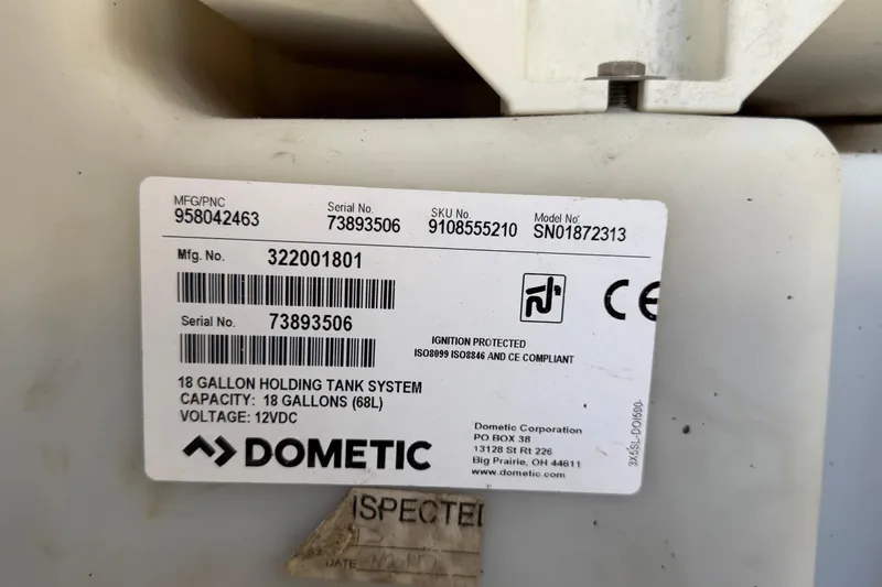 Slide: The Image of Label on Dometic 18-gallon holding tank system for 2018 Sea Ray Sundancer 260 boat. - 100