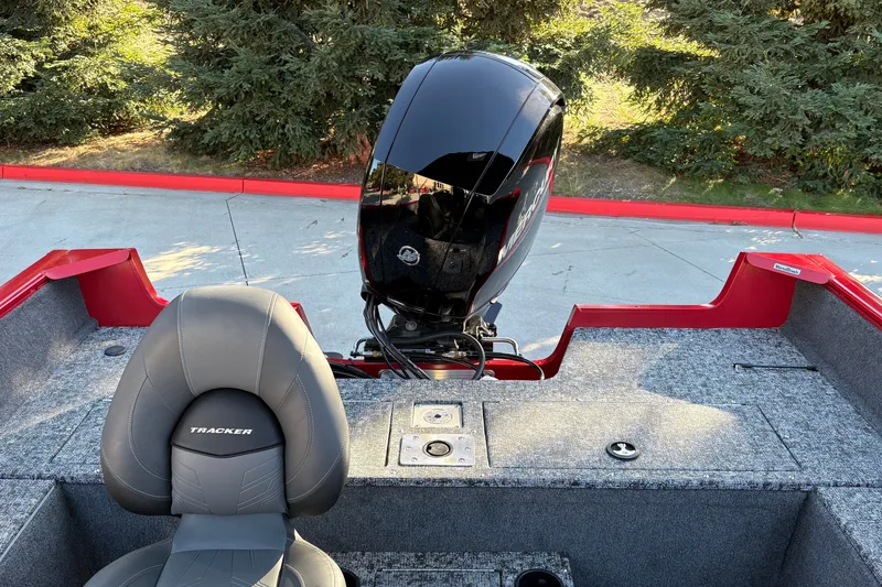 Slide: The Image of 2026 Tracker Pro Guide V-175 WT boat interior with Mercury engine and seating. - 21