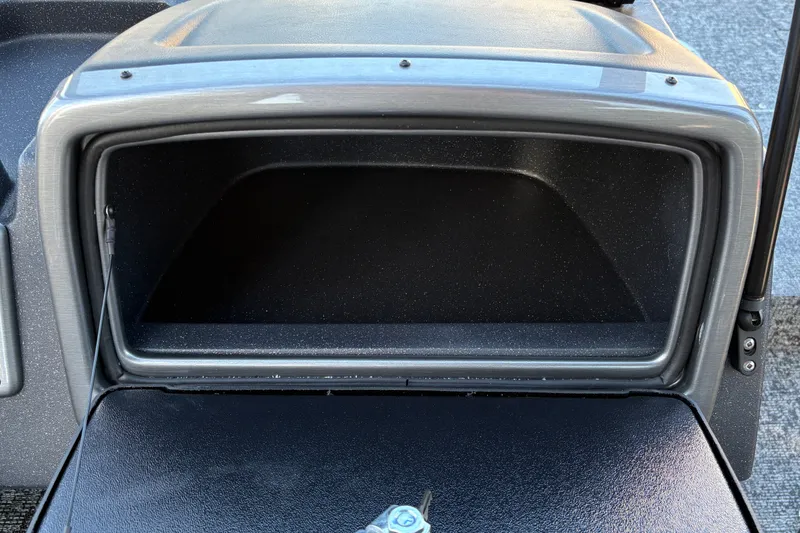 Slide: The Image of Open storage compartment in 2026 Tracker Pro Guide V-175 WT boat. - 40