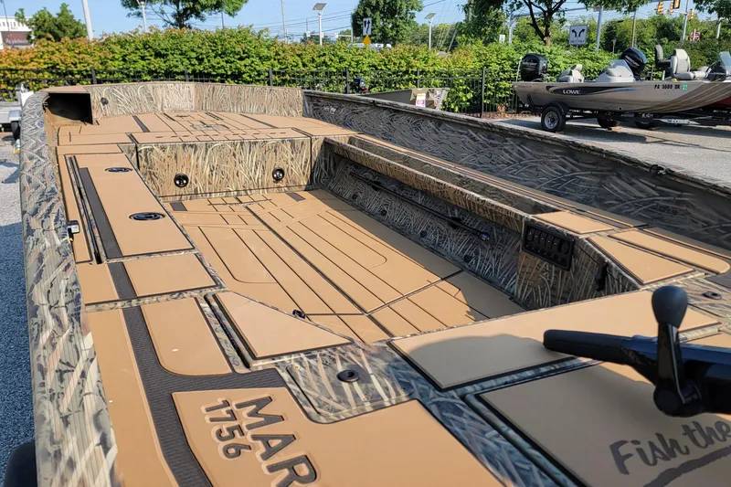 Slide: The Image of 2026 Tracker Grizzly 1756 T Marsh boat with camo design, ideal for fishing and hunting. - 3