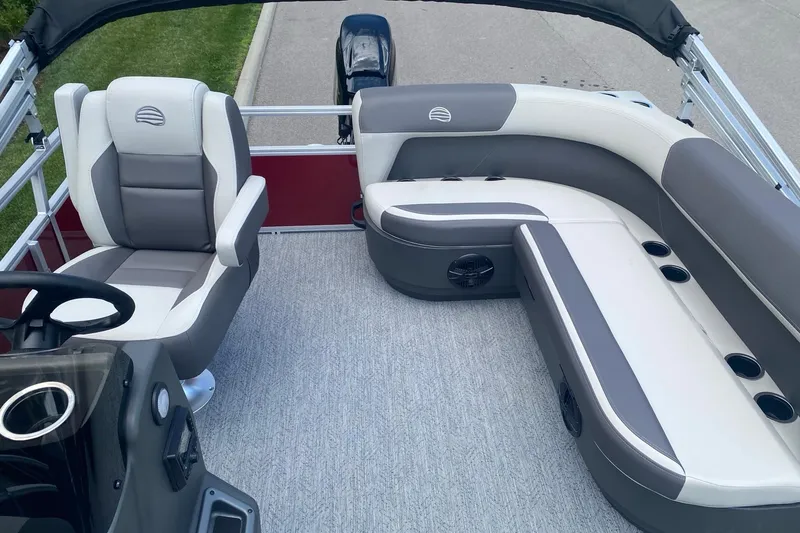 Slide: The Image of 2026 Sun Tracker Bass Buggy 16 XL Select interior with plush seating and modern design. - 5