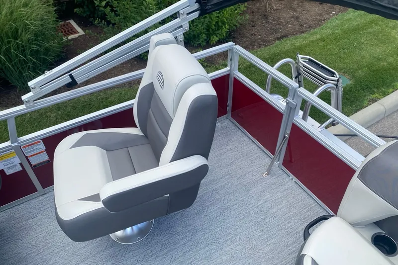 Slide: The Image of 2026 Sun Tracker Bass Buggy 16 XL Select boat seat, gray and white upholstery. - 6