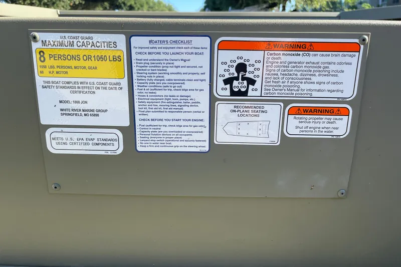 Slide: The Image of Safety and capacity labels on 2026 Tracker Grizzly 1860 Utility boat. - 4