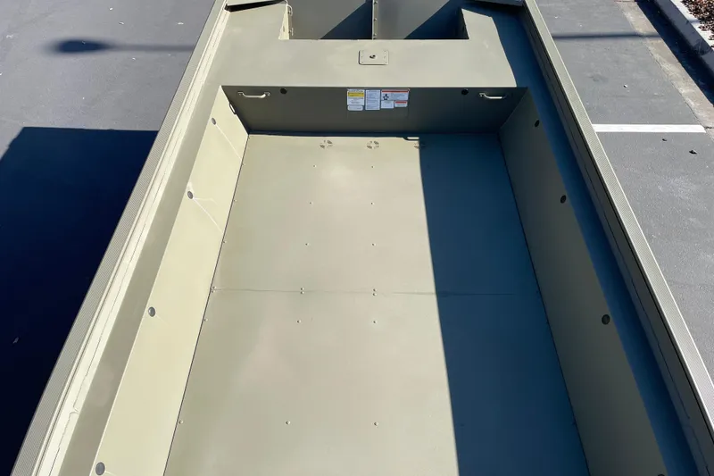 Slide: The Image of 2026 Tracker Grizzly 1860 Utility boat interior, showcasing spacious and durable design. - 8