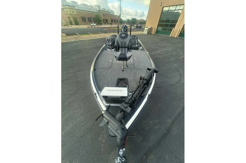 Slide: The Image of 2026 Ranger Z521R fishing boat with Garmin equipment, parked outdoors. - 4