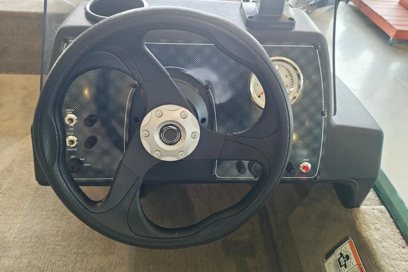Slide: The Image of Steering wheel and dashboard of 2026 Tracker Bass Tracker Classic Limited boat. - 55