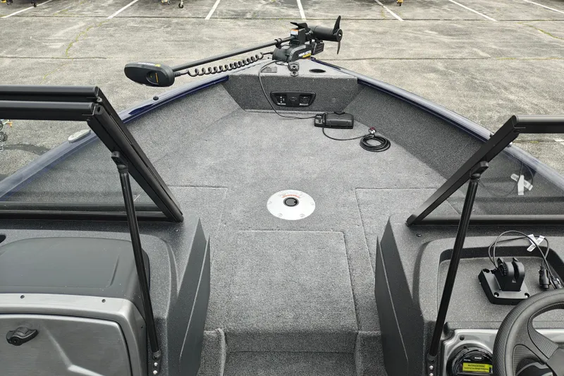 Slide: The Image of 2026 Tracker Pro Guide V-175 WT boat interior with trolling motor and spacious deck. - 11