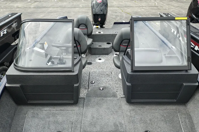 Slide: The Image of 2026 Tracker Pro Guide V-175 WT boat interior with dual consoles and seating. - 14