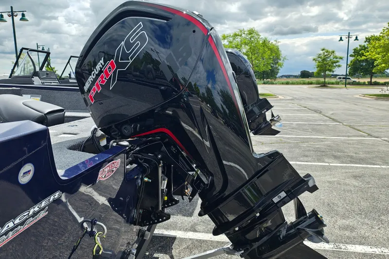 Slide: The Image of 2026 Tracker Pro Guide V-175 WT with Mercury Pro XS engine in a parking lot. - 3