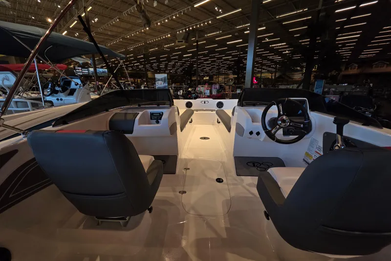 Slide: The Image of Interior view of 2026 Tahoe T21 boat, featuring sleek seating and modern dashboard. - 5