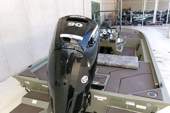 Slide: The Image of 2026 Tracker Grizzly 1860 CC boat with Mercury 90 engine, interior view. - 5