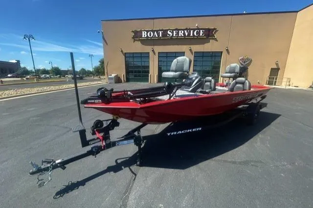 The Image of 2026 Tracker Pro Team 190 boat parked outside a boat service center. - 0