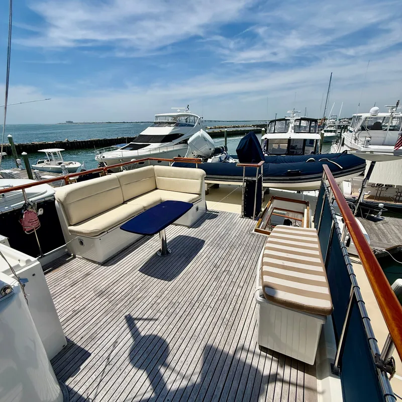 Slide: The Image of Deck of a 1999 Grand Banks 52 Europa in harbor. - 11