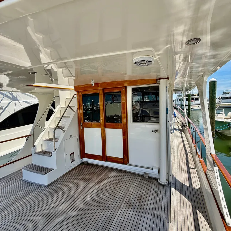 Slide: The Image of 1999 Grand Banks 52 Europa yacht docked at marina. - 3