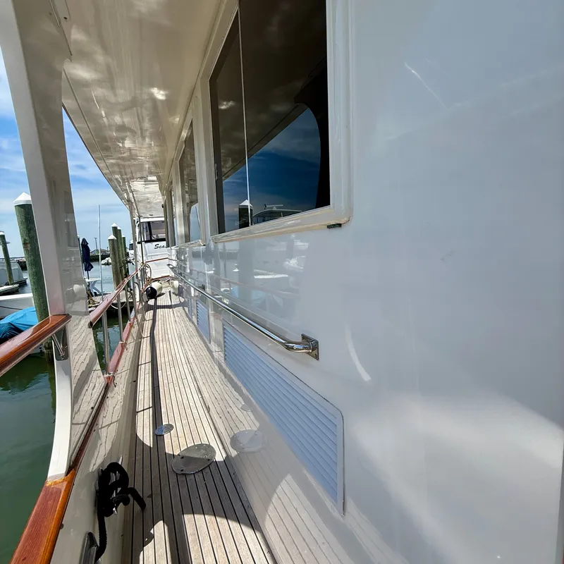 Slide: The Image of Grand Banks 52 Europa 1999, side view on water. - 30