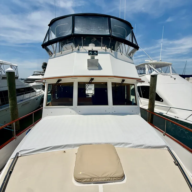 Slide: The Image of 1999 Grand Banks 52 Europa yacht docked at marina. - 31